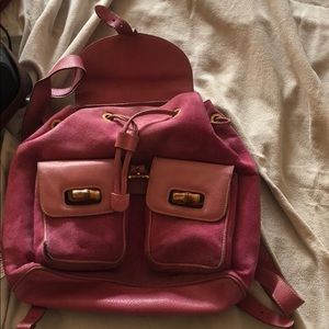A vintage Gucci pink backpack